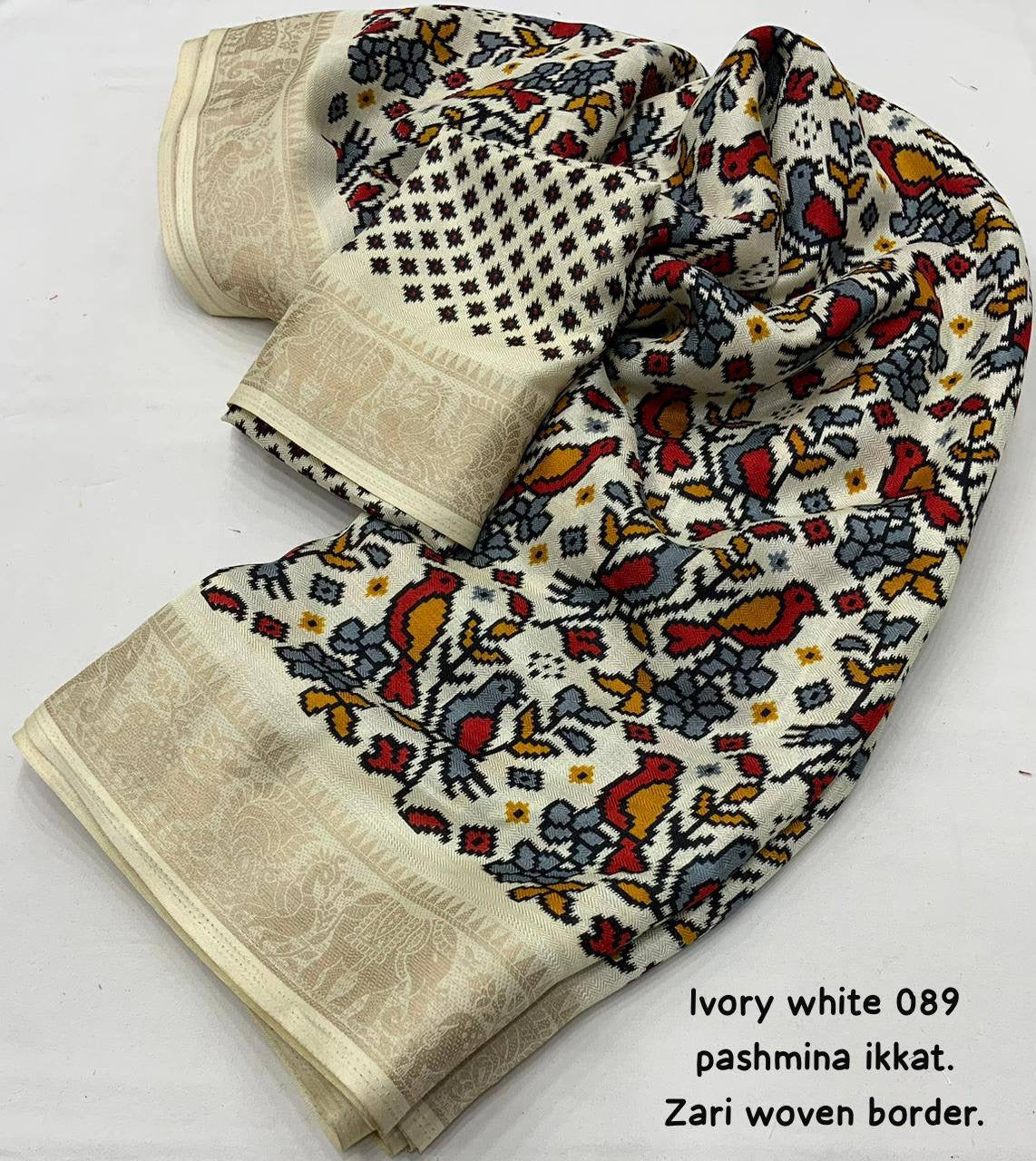 Beautifully Designed Ivory White Pashmina Ikkat Style Printed Saree