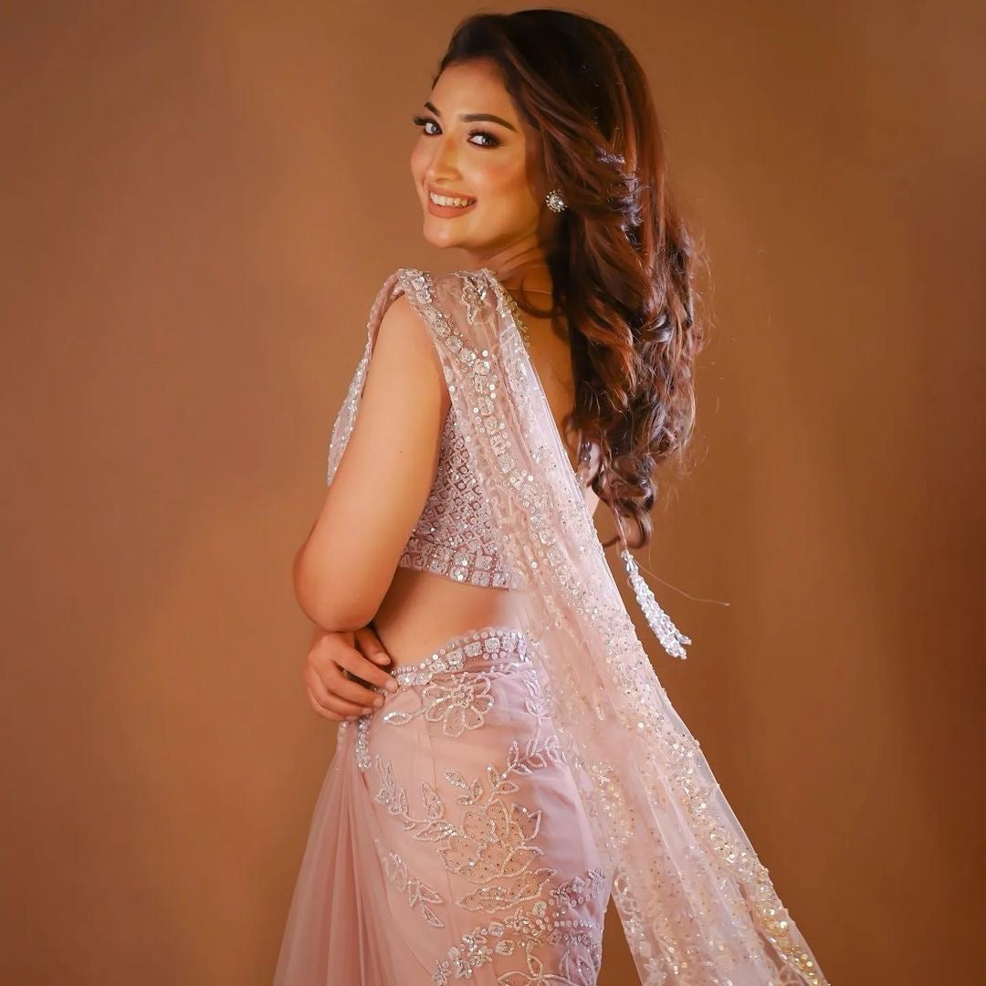 Bollywood Celebrity-Inspired Exquisite Peach Net Saree