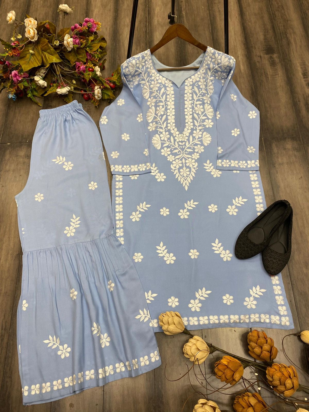 Stylish Muslin Kurti paired with a beautifully embroidered Sharara