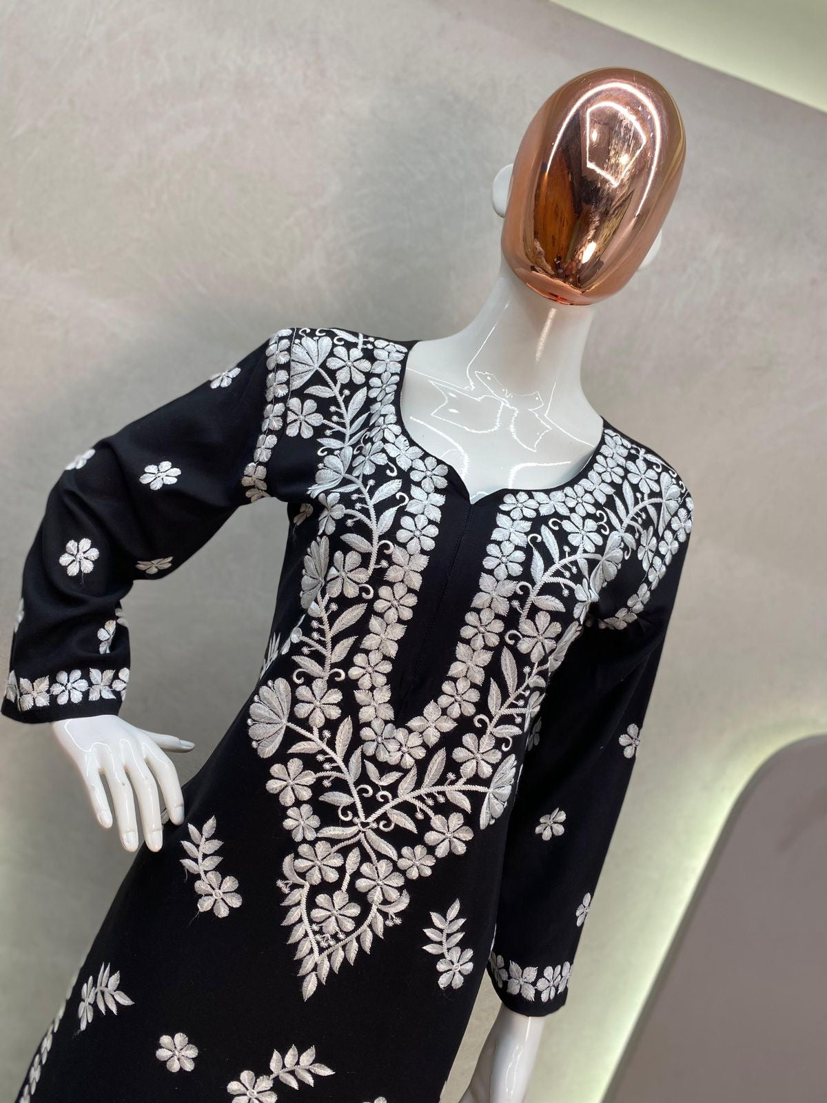 Stylish Muslin Kurti paired with a beautifully embroidered Sharara