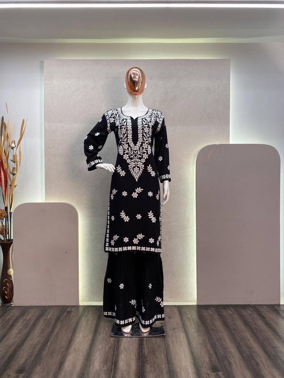 Stylish Muslin Kurti paired with a beautifully embroidered Sharara